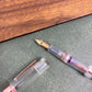 Pre-Owned Conklin Mark Twain Fountain Pen - Transparent with Rose Gold Trim Omniflex